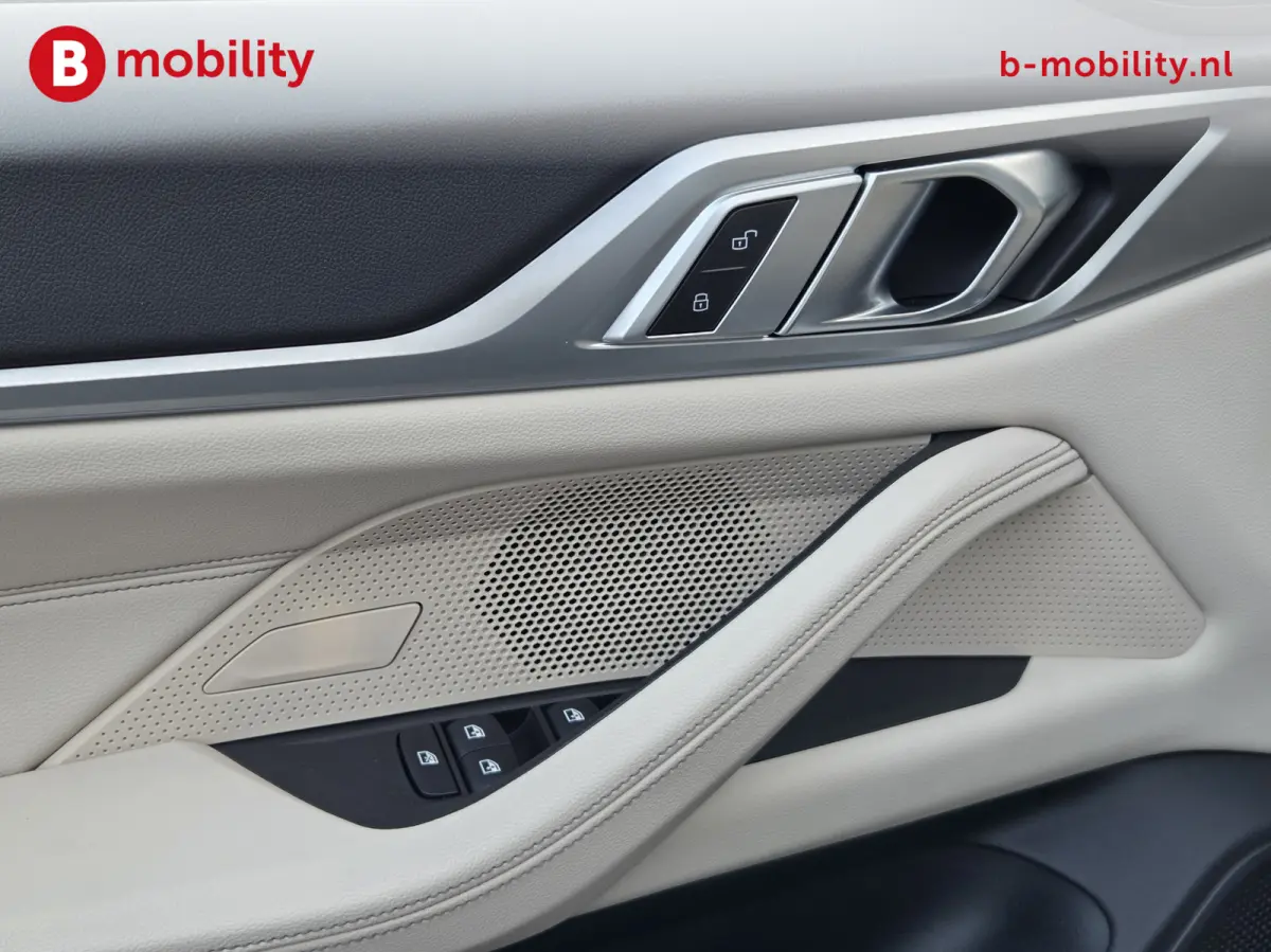 M50 High Executive M-Sport 84 kWh 'Tansanitblau' SOH 96% NL Auto! | 360 Camera | Hifi | DAB | Snelladen | Leer | Head-Up