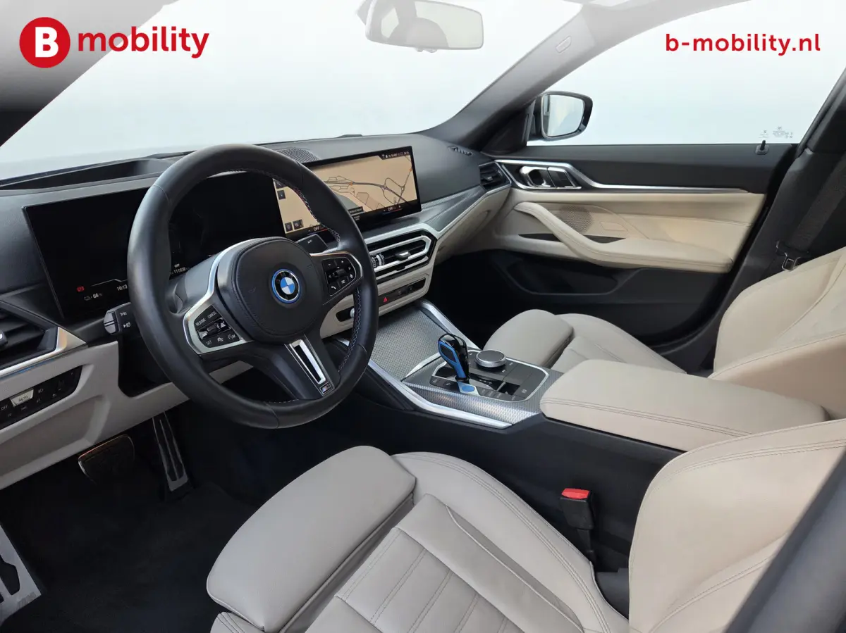 M50 High Executive M-Sport 84 kWh 'Tansanitblau' SOH 96% NL Auto! | 360 Camera | Hifi | DAB | Snelladen | Leer | Head-Up