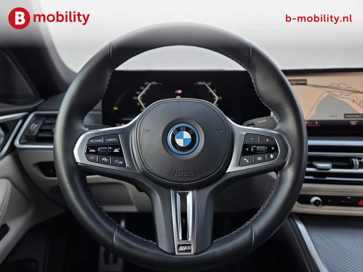 M50 High Executive M-Sport 84 kWh 'Tansanitblau' SOH 96% NL Auto! | 360 Camera | Hifi | DAB | Snelladen | Leer | Head-Up