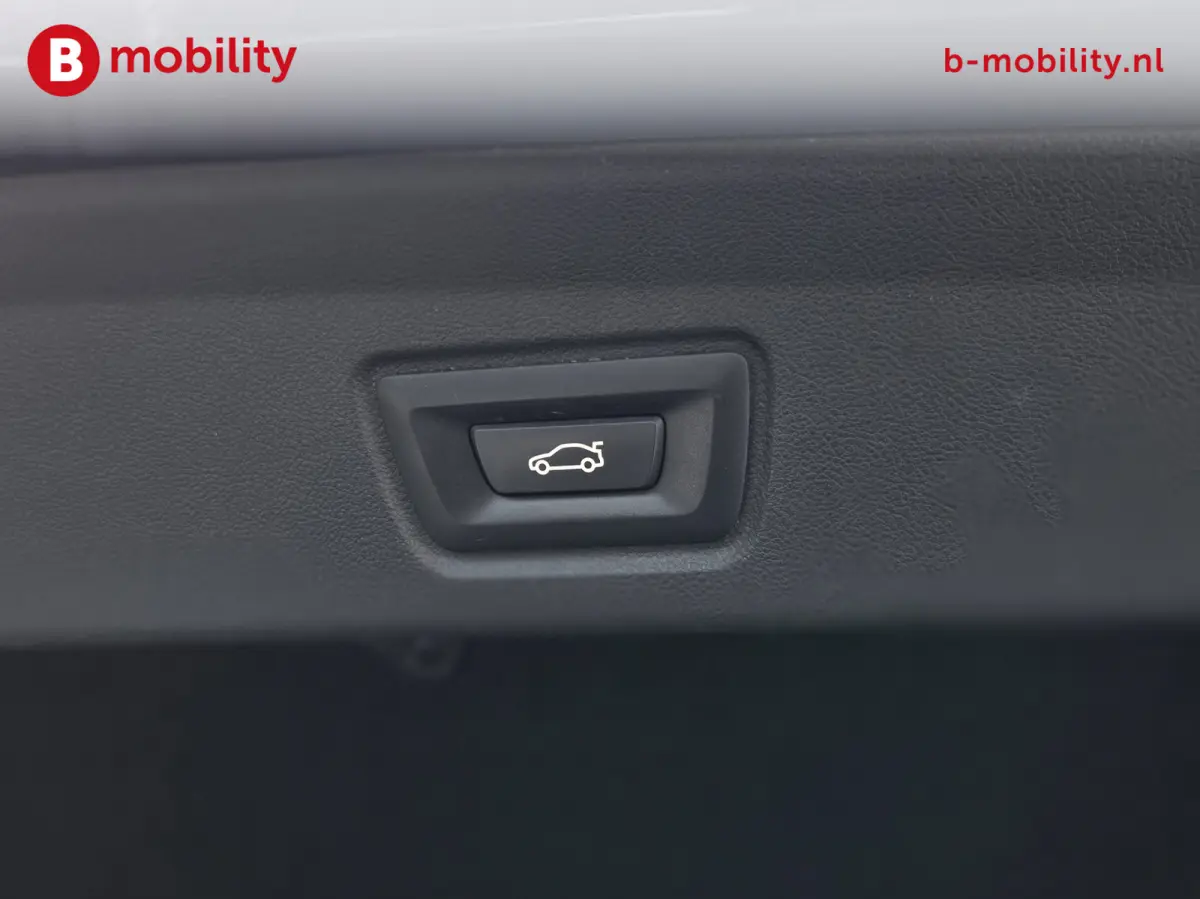 M50 High Executive M-Sport 84 kWh 'Tansanitblau' SOH 96% NL Auto! | 360 Camera | Hifi | DAB | Snelladen | Leer | Head-Up