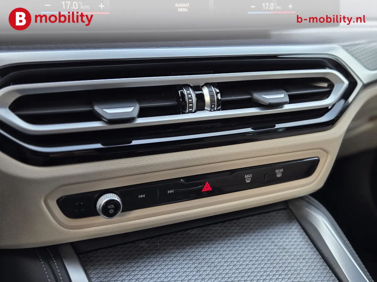 M50 High Executive M-Sport 84 kWh 'Tansanitblau' SOH 96% NL Auto! | 360 Camera | Hifi | DAB | Snelladen | Leer | Head-Up