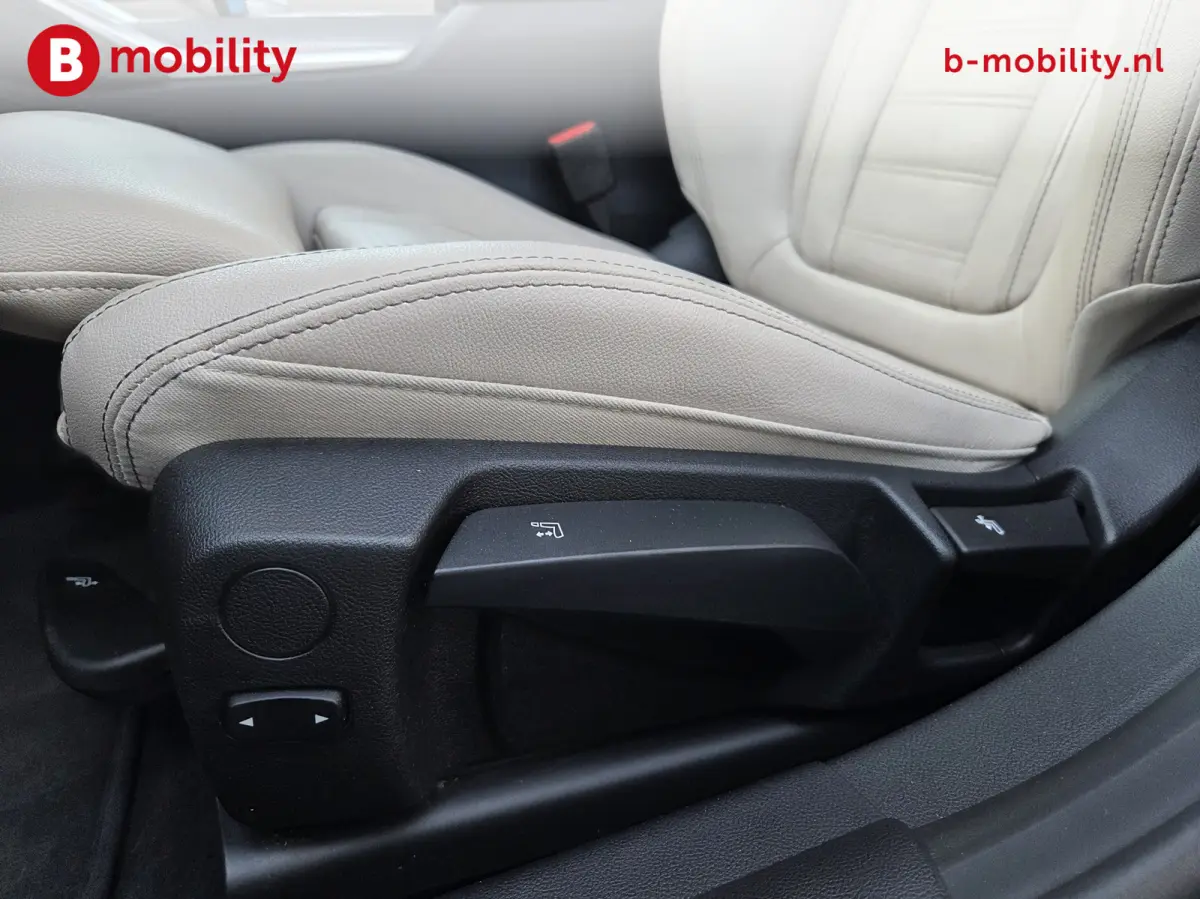 M50 High Executive M-Sport 84 kWh 'Tansanitblau' SOH 96% NL Auto! | 360 Camera | Hifi | DAB | Snelladen | Leer | Head-Up