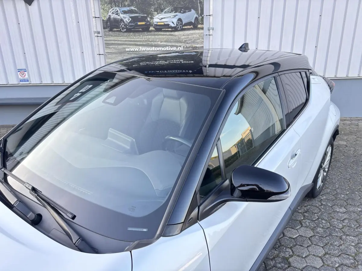 1.8 Hybrid Executive Bi-Tone | Dodehoek | Carplay | Trekhaak | PDC V+A