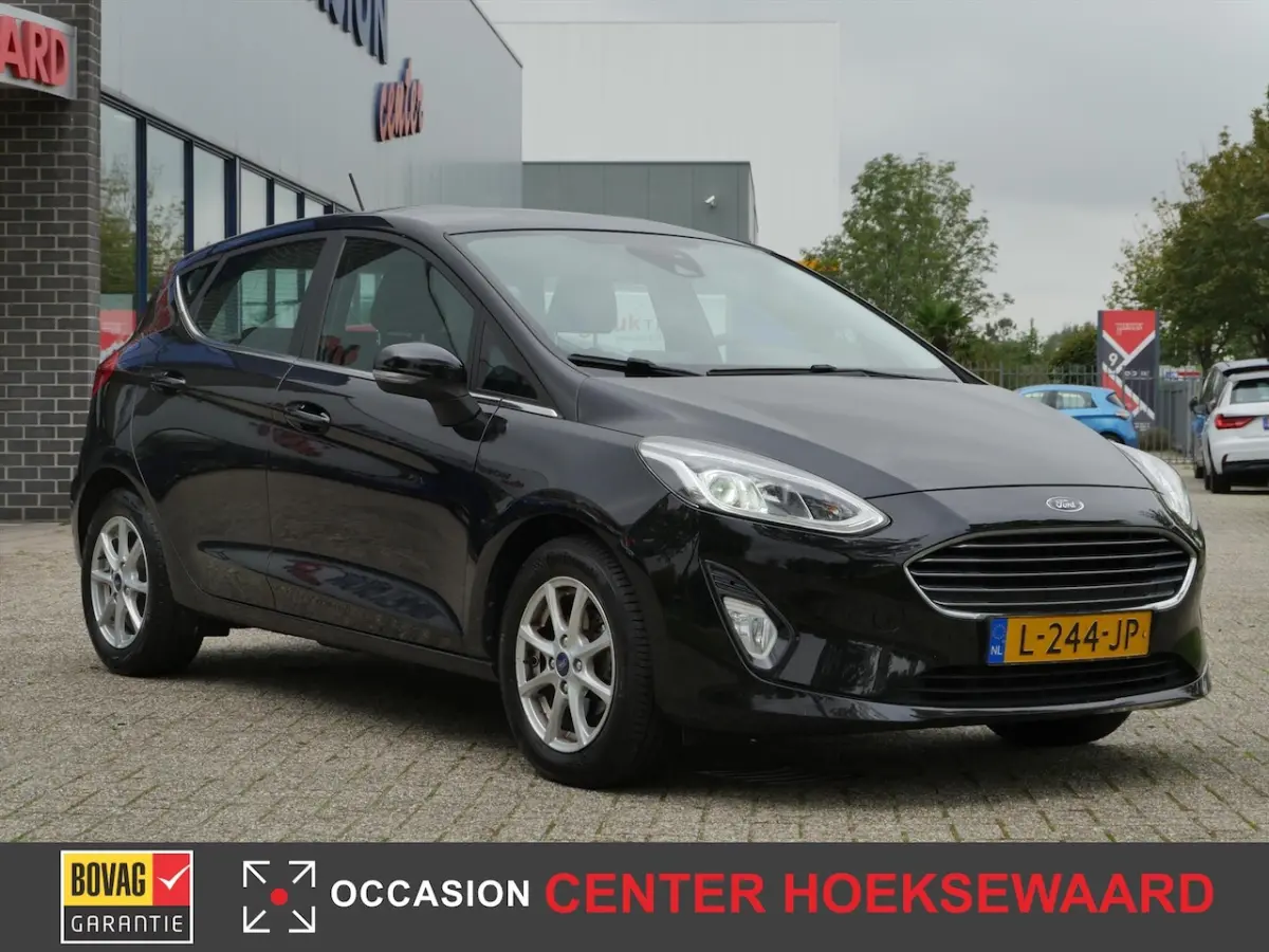 1.0 EcoBoost 95pk Titanium | Technology Pack | Agate Black | Full Map Navigatie |