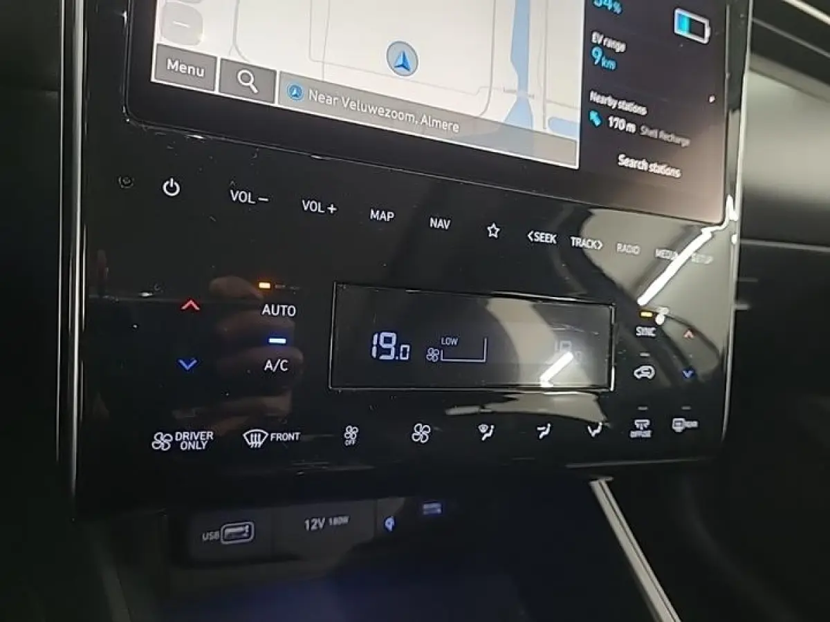 1.6 T-GDI PHEV PREMIUM SKY 4WD I AUTOMAAT I SCHUIF/KANTELDAK I 360 CAMERA I APPLE CARPLAY I CLIMATE CONTROL