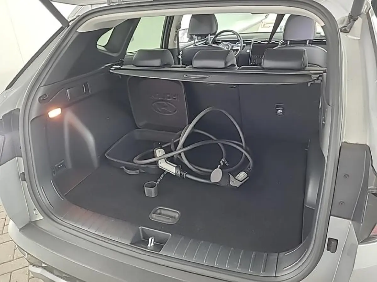 1.6 T-GDI PHEV PREMIUM SKY 4WD I AUTOMAAT I SCHUIF/KANTELDAK I 360 CAMERA I APPLE CARPLAY I CLIMATE CONTROL