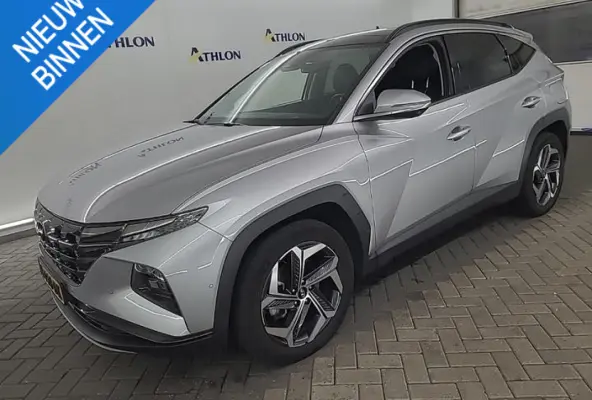 1.6 T-GDI PHEV PREMIUM SKY 4WD I AUTOMAAT I SCHUIF/KANTELDAK I 360 CAMERA I APPLE CARPLAY I CLIMATE CONTROL