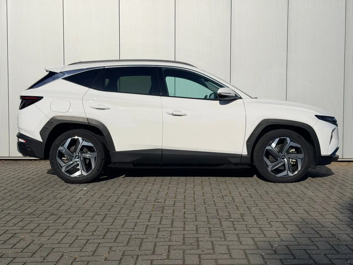 1.6 T-GDI PHEV Comfort Smart 4WD / Stoelverwarming / Stuurverwarming / Achteruitrijcamera / Parkeersensoren Voor + Achter / Navigatie / Apple Carplay & Android Auto / | Achteruitrijcamera | 
