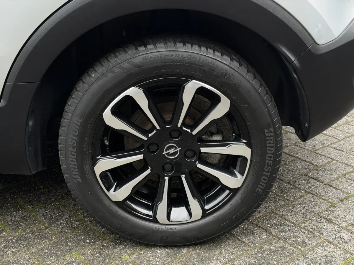 1.2 Turbo AGR-comfortstoel | Half Leder | Navi | Carplay | Camera | Chrome pakket