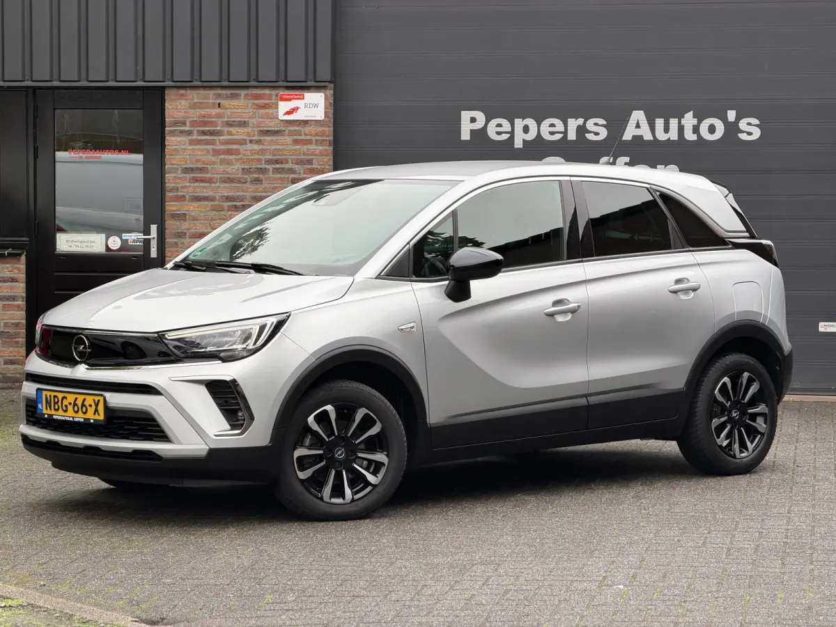 1.2 Turbo AGR-comfortstoel | Half Leder | Navi | Carplay | Camera | Chrome pakket