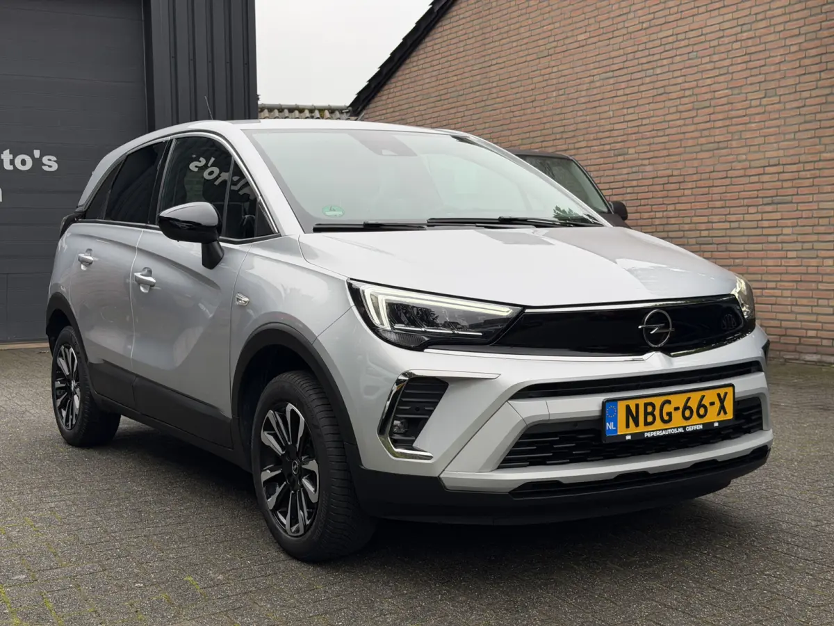 1.2 Turbo AGR-comfortstoel | Half Leder | Navi | Carplay | Camera | Chrome pakket