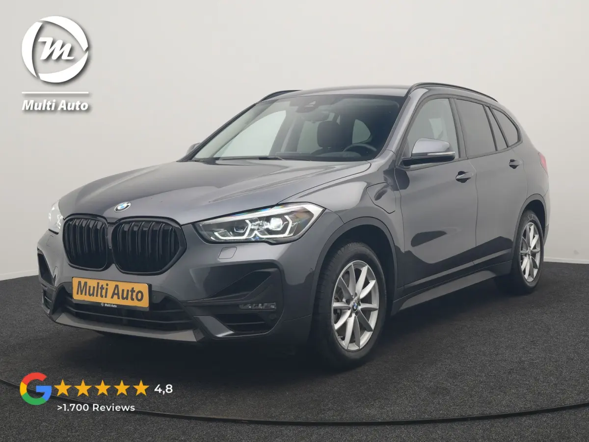 xDrive25e Advantage PHEV 221pk Dealer O.H | SOH 87,9% | Trekhaak Afn. | Adaptive Cruise | Head Up | Camera | Sportstoelen Memory & Verwarmd | Stuur Verwarmd | Sfeerverlichting | Navigatie | 