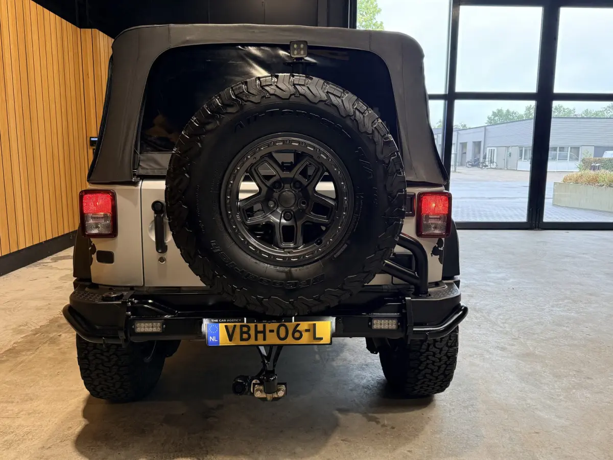 | Cabriolet | Trekhaak | Camera | Airco | 17 inch Youngtimer