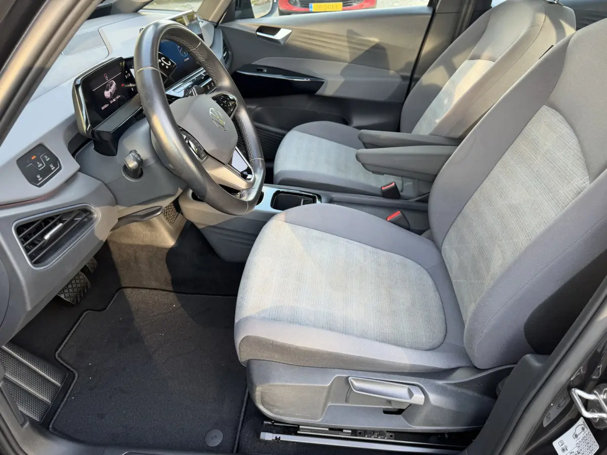 Pro 58 kWh / Sensoren / Carplay / Verw. Stuur + Stoelen / SoH 92,1% /
