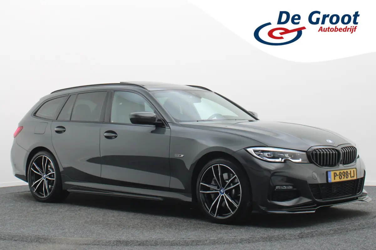 330e Business Edition Plus M-sport Panoramadak, M-Sportstoelen, Carbon, Camera, Elektr. Trekhaak, 19''