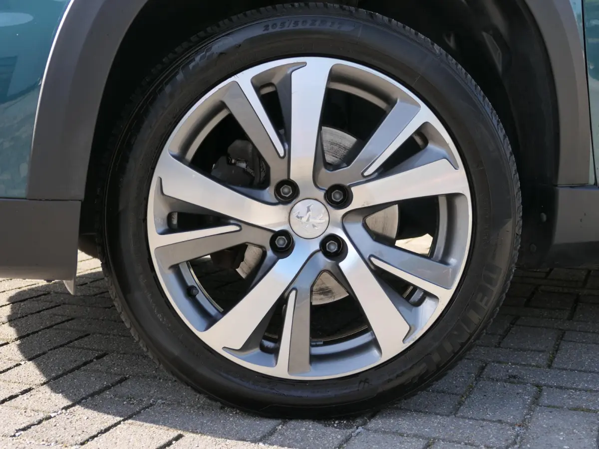 1.2 PureTech Blue Lease Allure | 130 PK | Nieuwe distributieriem | Panoramadak | Climate Control | Achteruitrijcamera | Cruise Control | Trekhaak | Half leder | Lichtmetalen velgen | NAP