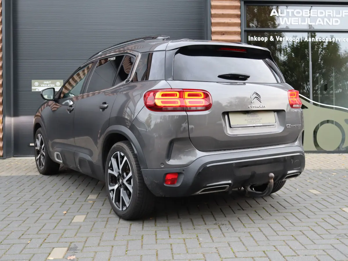 1.6 PureTech Business Plus 180PK TREKHAAK NIEUWSTAAT I Leer I Navi I Carplay I Trekhaak 1500KG I Carplay I Winterpakket I 18" I