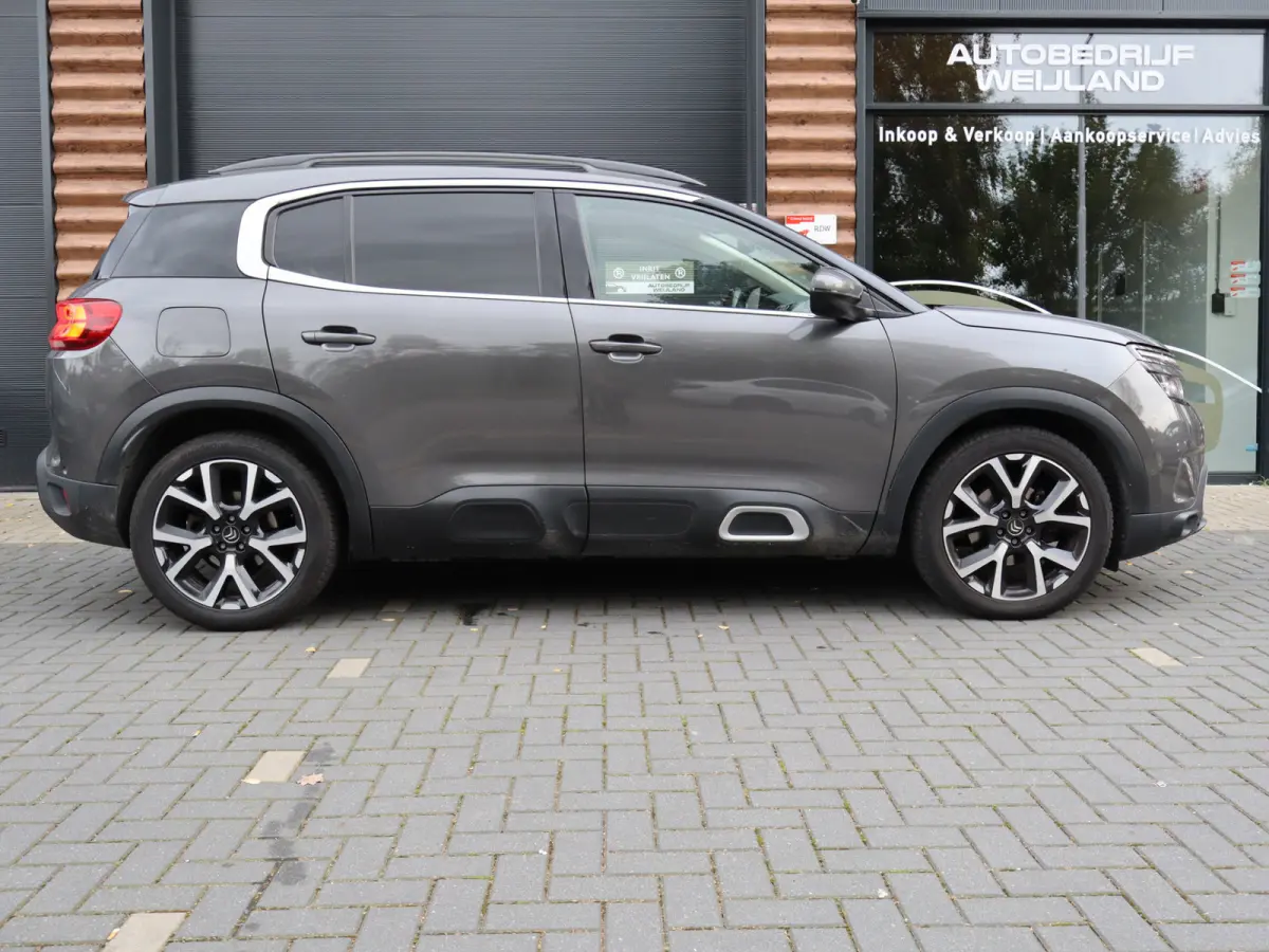1.6 PureTech Business Plus 180PK TREKHAAK NIEUWSTAAT I Leer I Navi I Carplay I Trekhaak 1500KG I Carplay I Winterpakket I 18" I