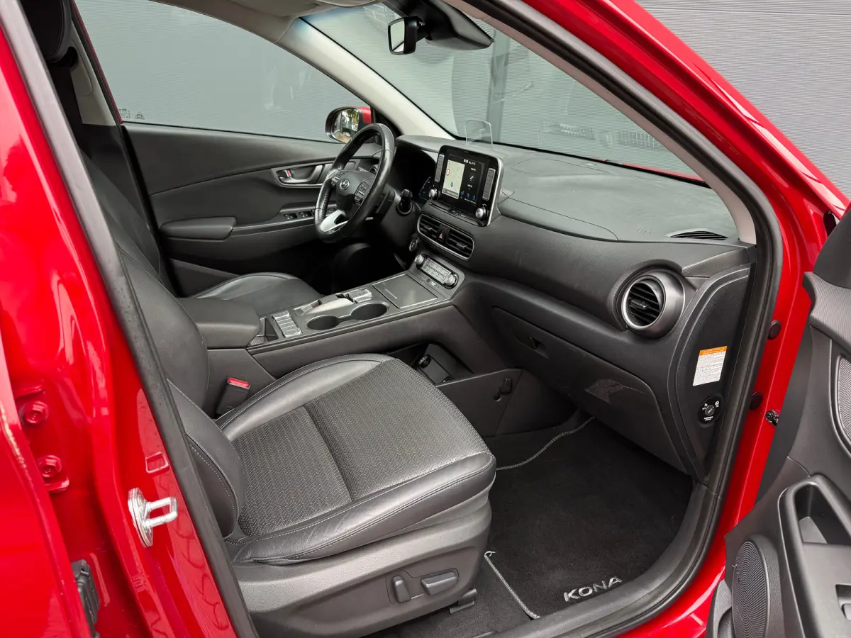 EV Premium 64 kWh / 64 kWh accupakket / Volledig elektrisch / Actieradius tot 449 km WLTP / Premium uitvoering / Warmtepomp / Head-up display / Lederen bekleding / Elektrisch verstelbare sto