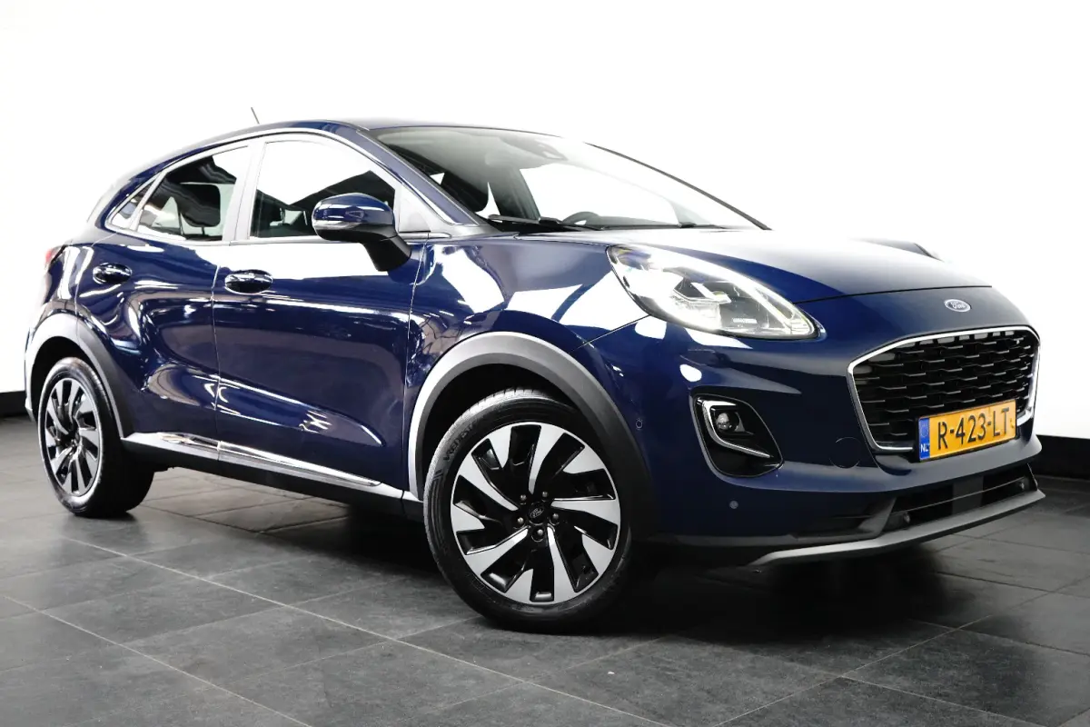 1.0 Titanium | Trekhaak | Camera | Cruise Control | Apple Carplay | Navigatie