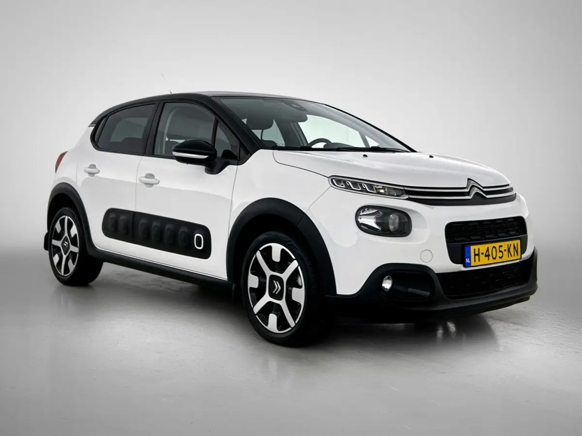 Shine 82pk | Lage kilometerstand | Navigatie via Apple Carplay / Android Auto | Achteruitrijcamera | Climate Control | Cruise Control | Parkeersensoren | Bluetooth | Elektrisch inklapbare sp