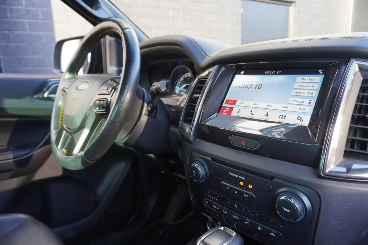 2.0 EcoBlue 213PK AUT. 4X4 3.500KG Wildtrak Supercab - AC/Climate - Navi - Cruise - €21.900,- Excl.