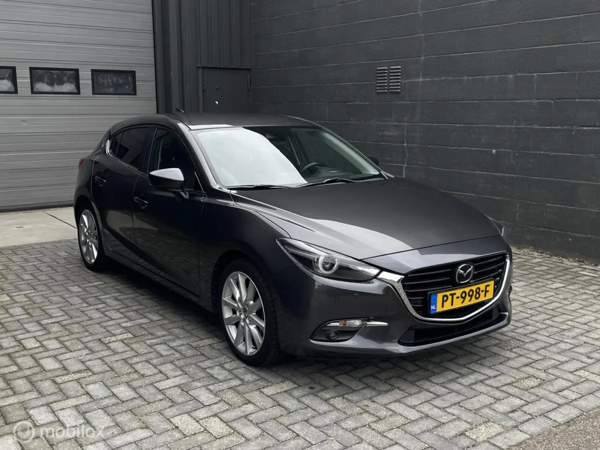 2.0 SkyActiv-G 120 GT-M Automaat | Leder | CarPlay | HUD | PDC | Trekhaak| BOSE | Xenon |