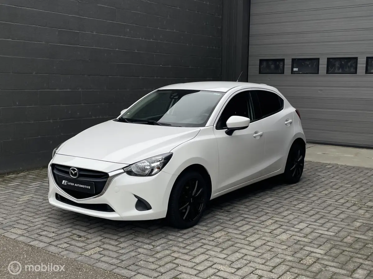 1.5 Skyactiv-G Niseko | AIRCO | Trekhaak | PDC | Lichtmetaal | Lage KM-stand |