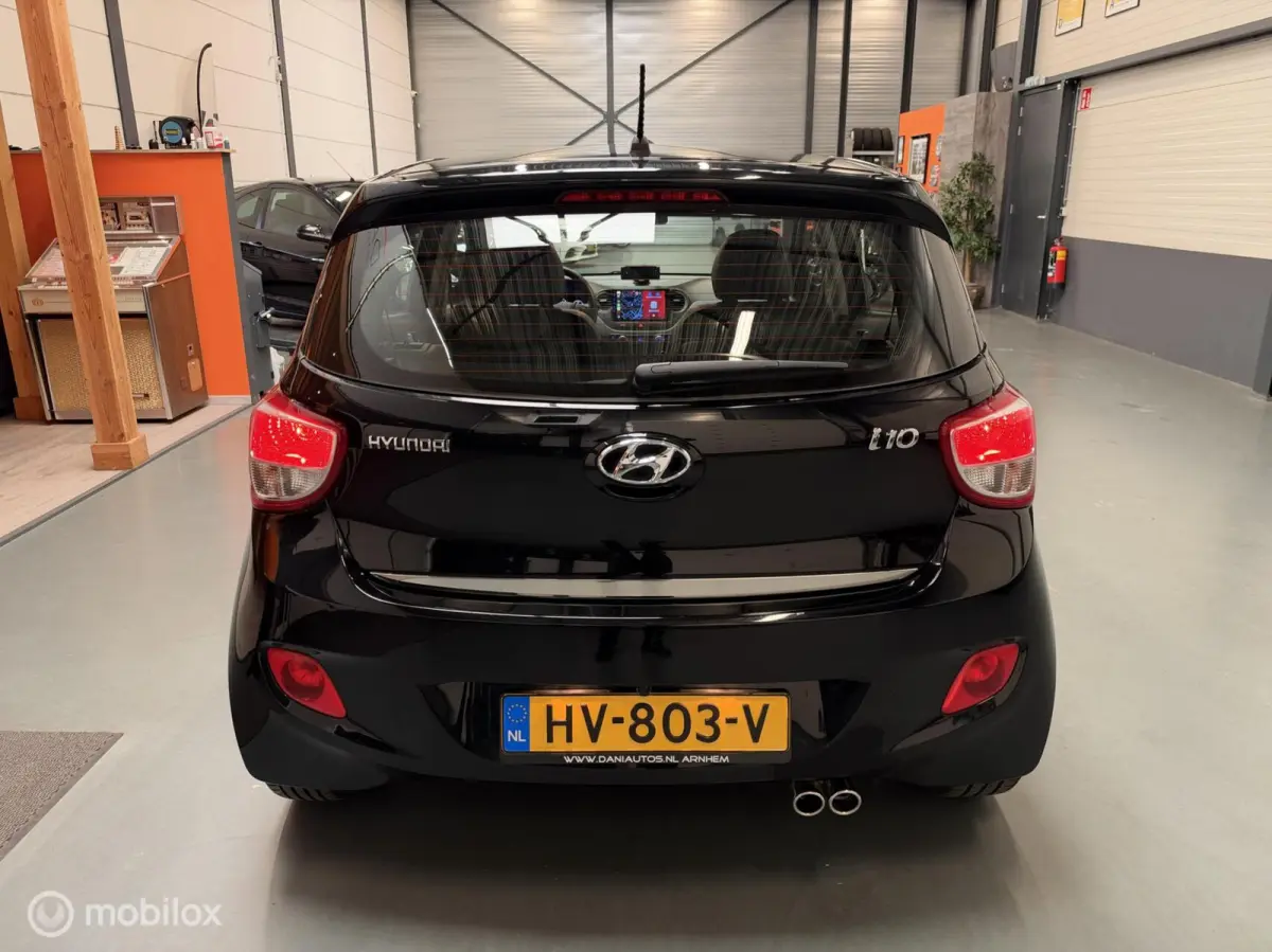1.0i i-Motion Premium Leer|Clima|CarPlay|LED