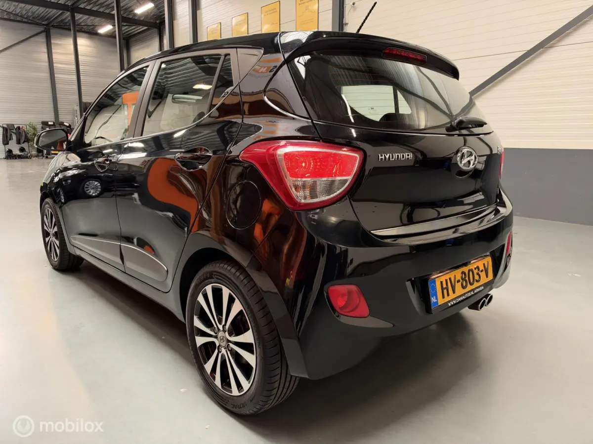 1.0i i-Motion Premium Leer|Clima|CarPlay|LED