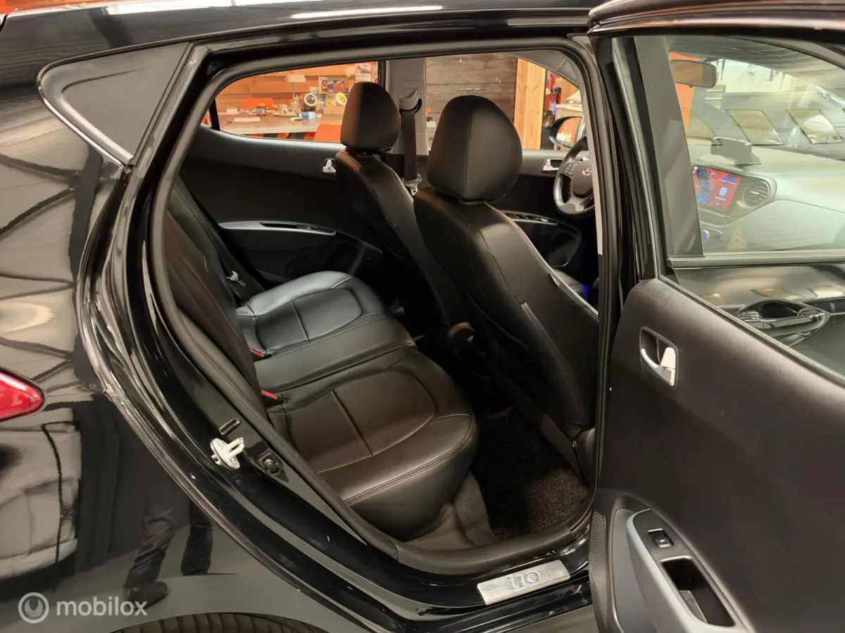 1.0i i-Motion Premium Leer|Clima|CarPlay|LED