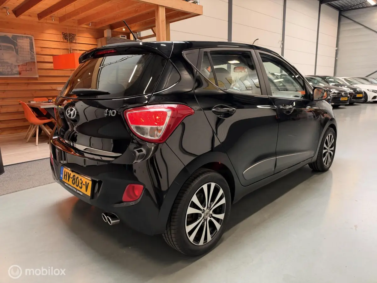 1.0i i-Motion Premium Leer|Clima|CarPlay|LED