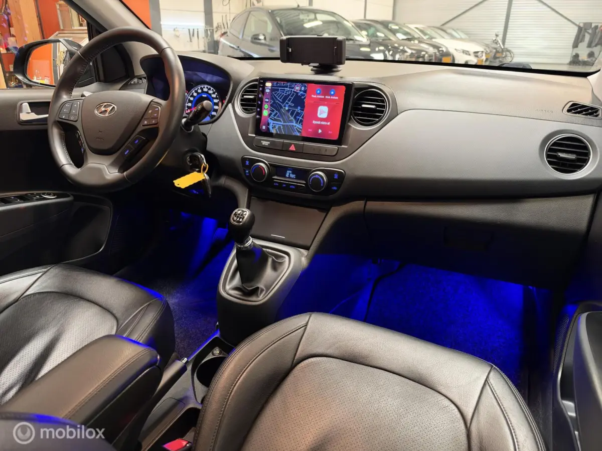1.0i i-Motion Premium Leer|Clima|CarPlay|LED