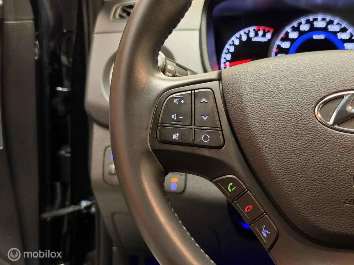 1.0i i-Motion Premium Leer|Clima|CarPlay|LED