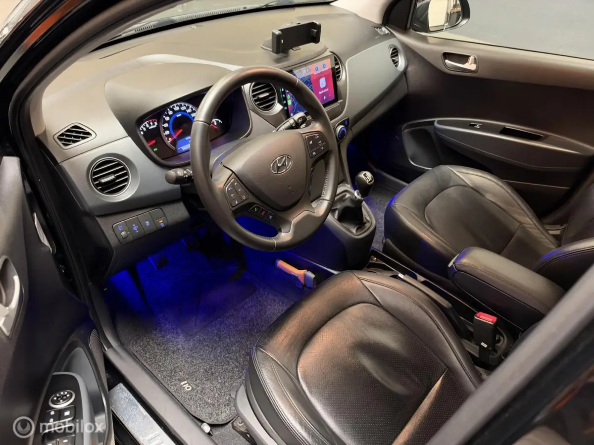1.0i i-Motion Premium Leer|Clima|CarPlay|LED