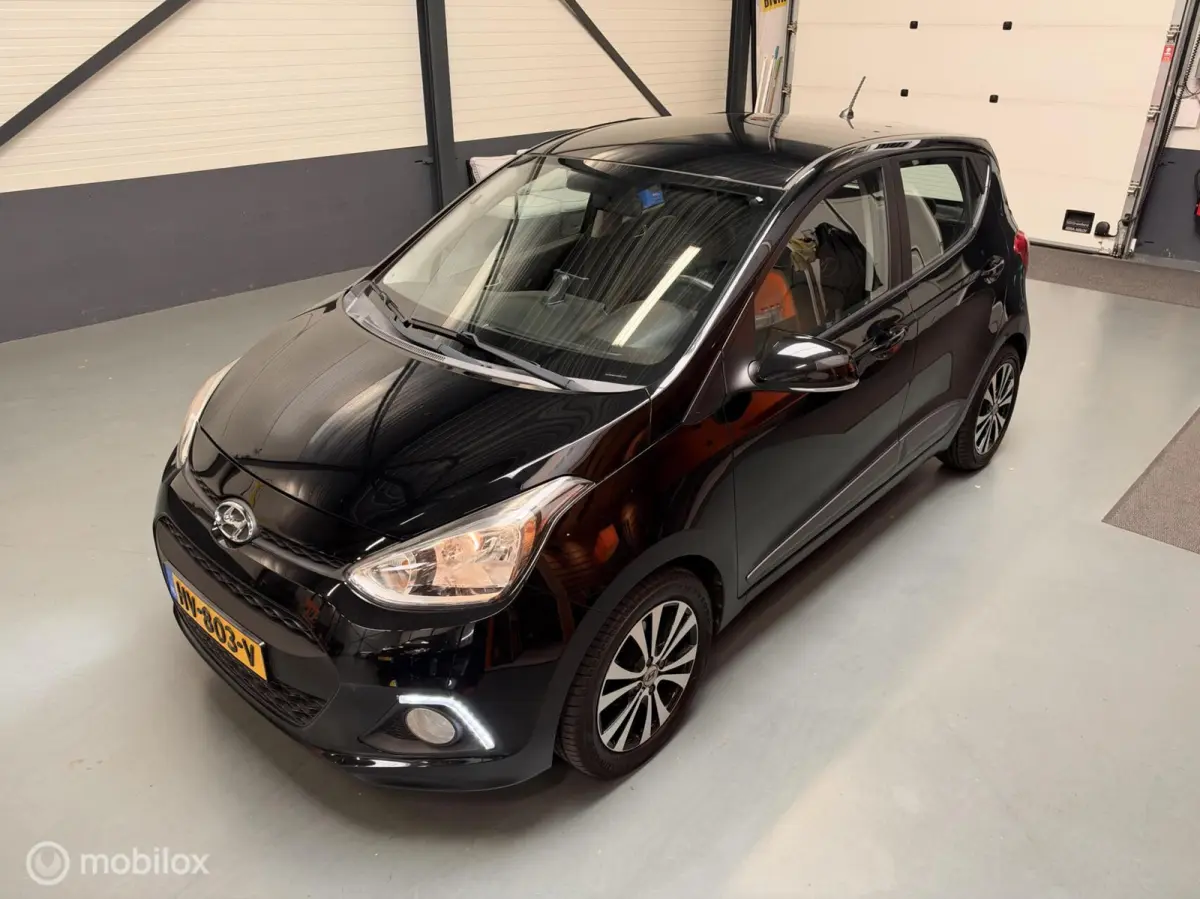 1.0i i-Motion Premium Leer|Clima|CarPlay|LED