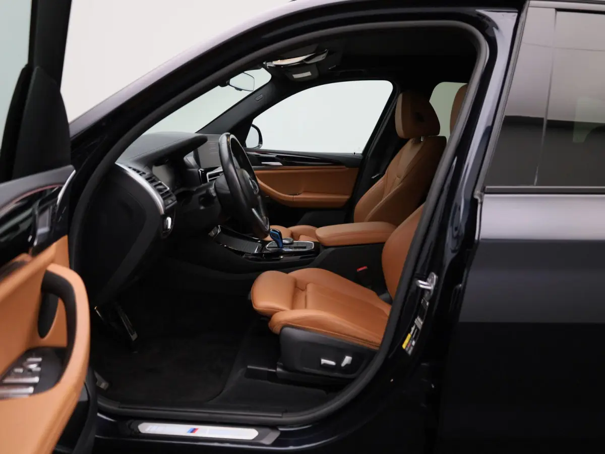 Executive 80 kWh | M-SPORT | TREKHAAK | PANORAMA-SCHUIFDAK | LEER | CAMERA | SPORTSTOELEN | STOELVERWARMING