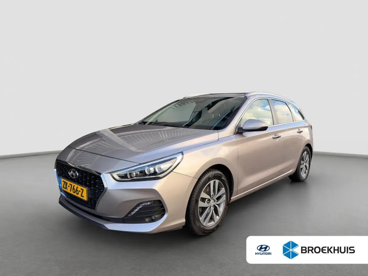 1.4 T-GDI 140pk Premium | Camera | Trekhaak | Climate controle | Carplay | Cruise controle | Half leder | Navigatie | Parkeersensoren