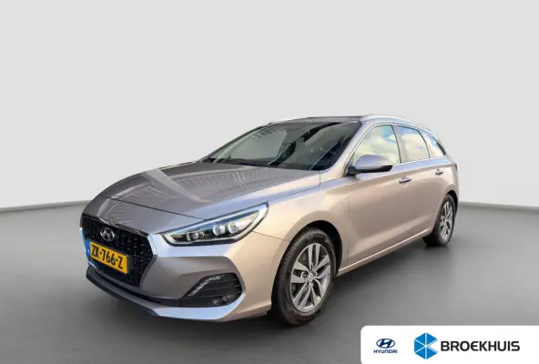 1.4 T-GDI 140pk Premium | Camera | Trekhaak | Climate controle | Carplay | Cruise controle | Half leder | Navigatie | Parkeersensoren
