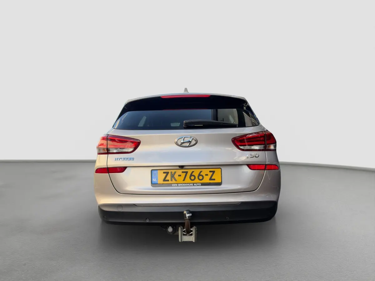1.4 T-GDI 140pk Premium | Camera | Trekhaak | Climate controle | Carplay | Cruise controle | Half leder | Navigatie | Parkeersensoren