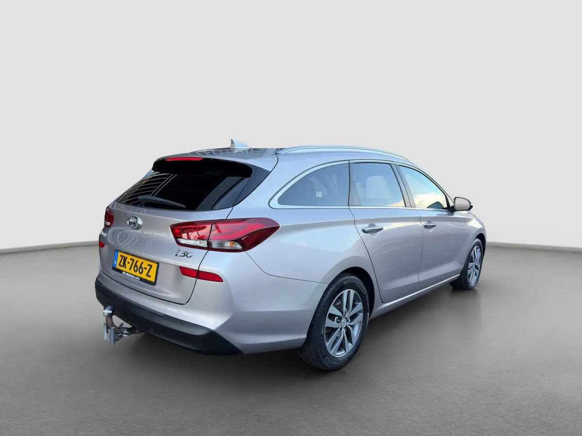 1.4 T-GDI 140pk Premium | Camera | Trekhaak | Climate controle | Carplay | Cruise controle | Half leder | Navigatie | Parkeersensoren