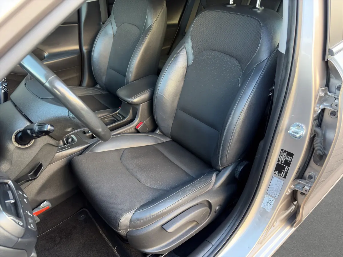 1.4 T-GDI 140pk Premium | Camera | Trekhaak | Climate controle | Carplay | Cruise controle | Half leder | Navigatie | Parkeersensoren