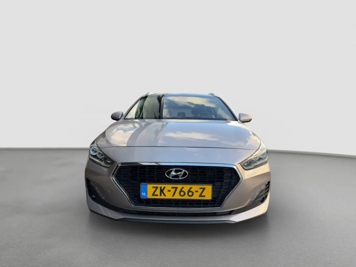 1.4 T-GDI 140pk Premium | Camera | Trekhaak | Climate controle | Carplay | Cruise controle | Half leder | Navigatie | Parkeersensoren