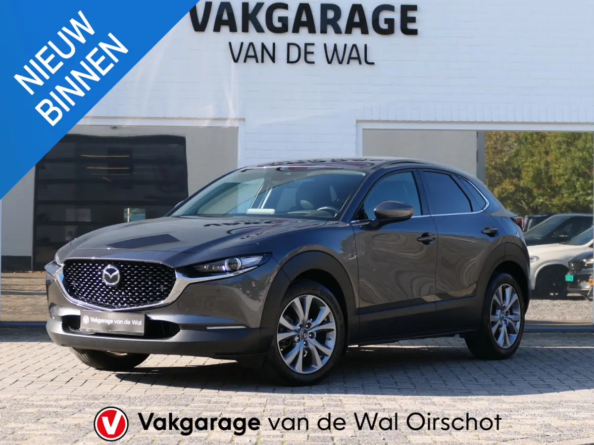 2.0 e-SkyActiv-G M Hybrid Exclusive-line | Trekhaak | Head-up display | Leder | Memory | Elektrische achterklep | Apple-/Android Carplay | Dodehoek detectie | Stuur-/Stoelverwarming | Achter