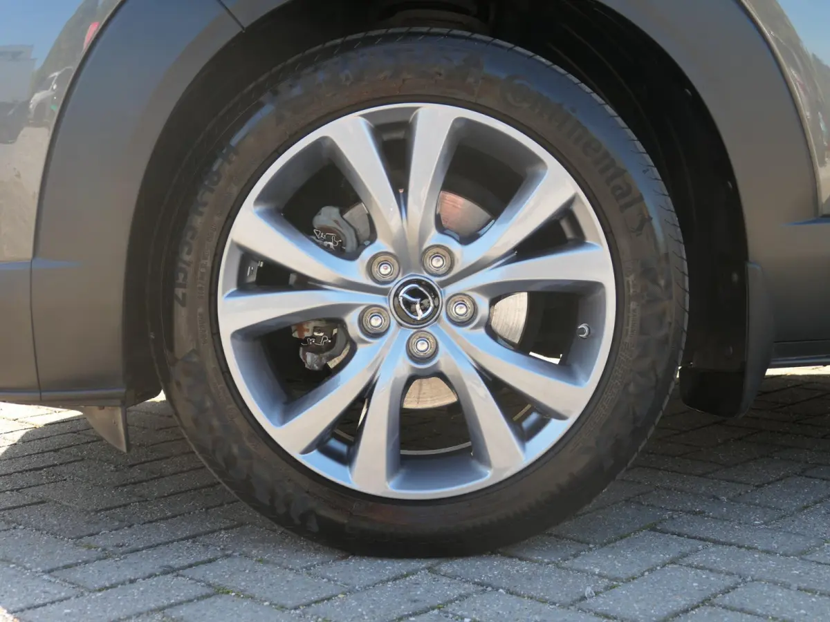 2.0 e-SkyActiv-G M Hybrid Exclusive-line | Trekhaak | Head-up display | Leder | Memory | Elektrische achterklep | Apple-/Android Carplay | Dodehoek detectie | Stuur-/Stoelverwarming | Achter