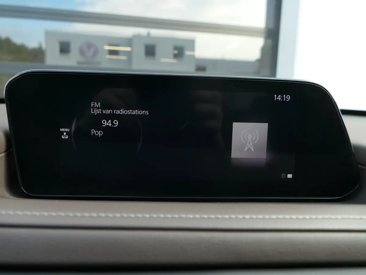 2.0 e-SkyActiv-G M Hybrid Exclusive-line | Trekhaak | Head-up display | Leder | Memory | Elektrische achterklep | Apple-/Android Carplay | Dodehoek detectie | Stuur-/Stoelverwarming | Achter