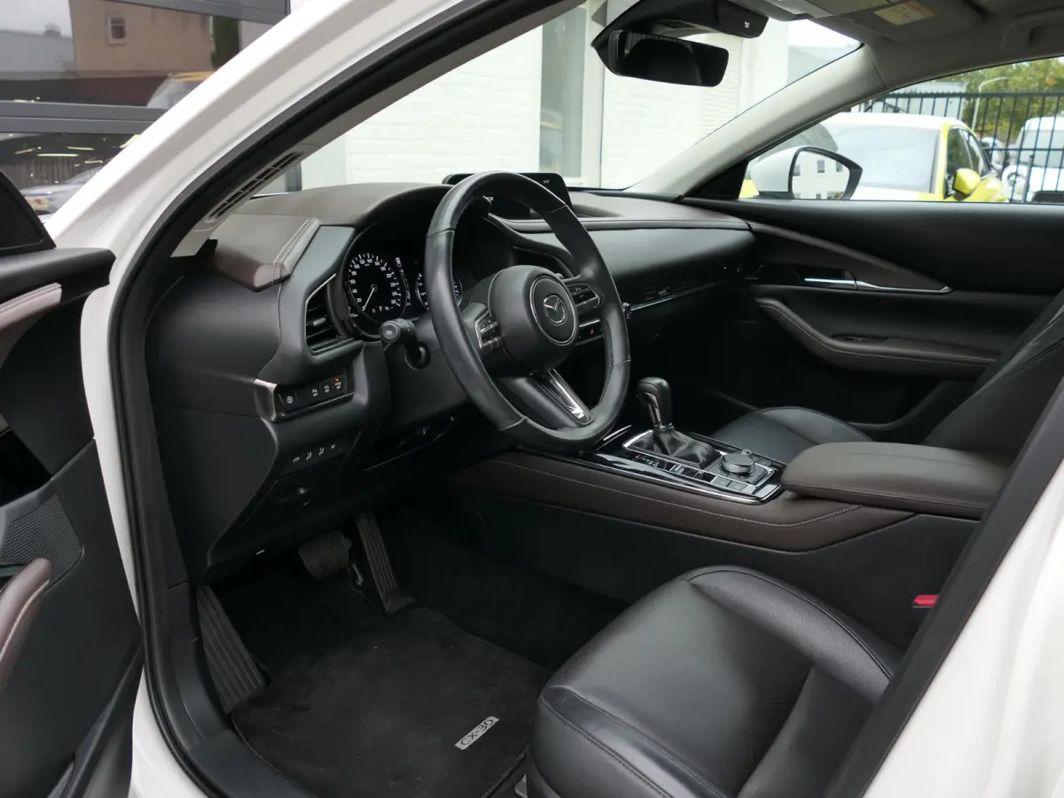 2.0 e-SkyActiv-G M Hybrid Sportive | BOSE | Head-up display | Leder | Memory | Elektrische achterklep | Apple-/Android Carplay | Dodehoek detectie | Stuur-/Stoelverwarming | Achteruitrijcame