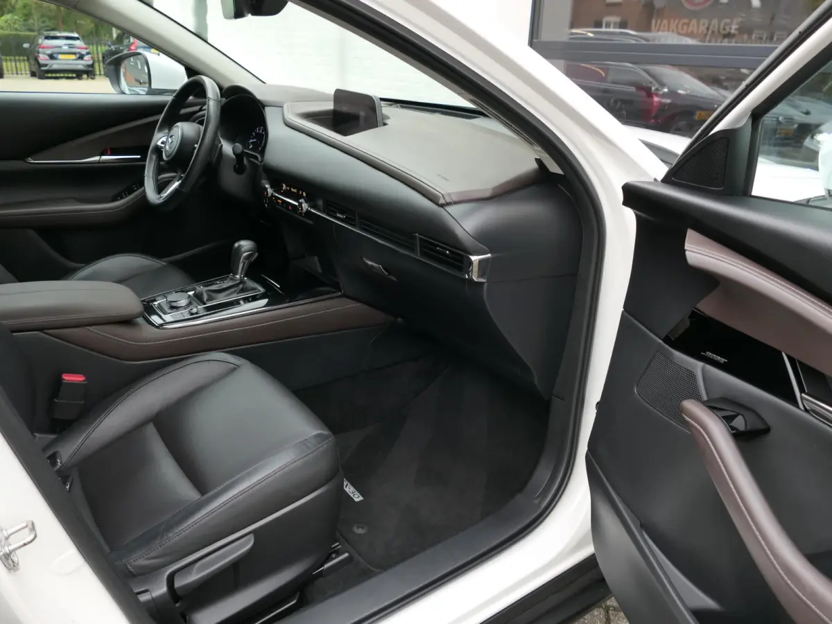 2.0 e-SkyActiv-G M Hybrid Sportive | BOSE | Head-up display | Leder | Memory | Elektrische achterklep | Apple-/Android Carplay | Dodehoek detectie | Stuur-/Stoelverwarming | Achteruitrijcame
