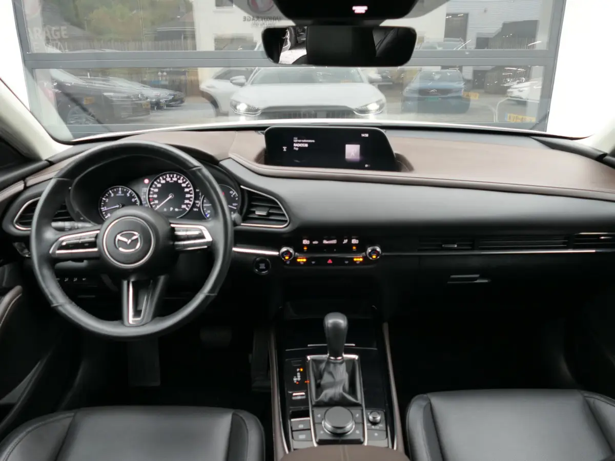 2.0 e-SkyActiv-G M Hybrid Sportive | BOSE | Head-up display | Leder | Memory | Elektrische achterklep | Apple-/Android Carplay | Dodehoek detectie | Stuur-/Stoelverwarming | Achteruitrijcame