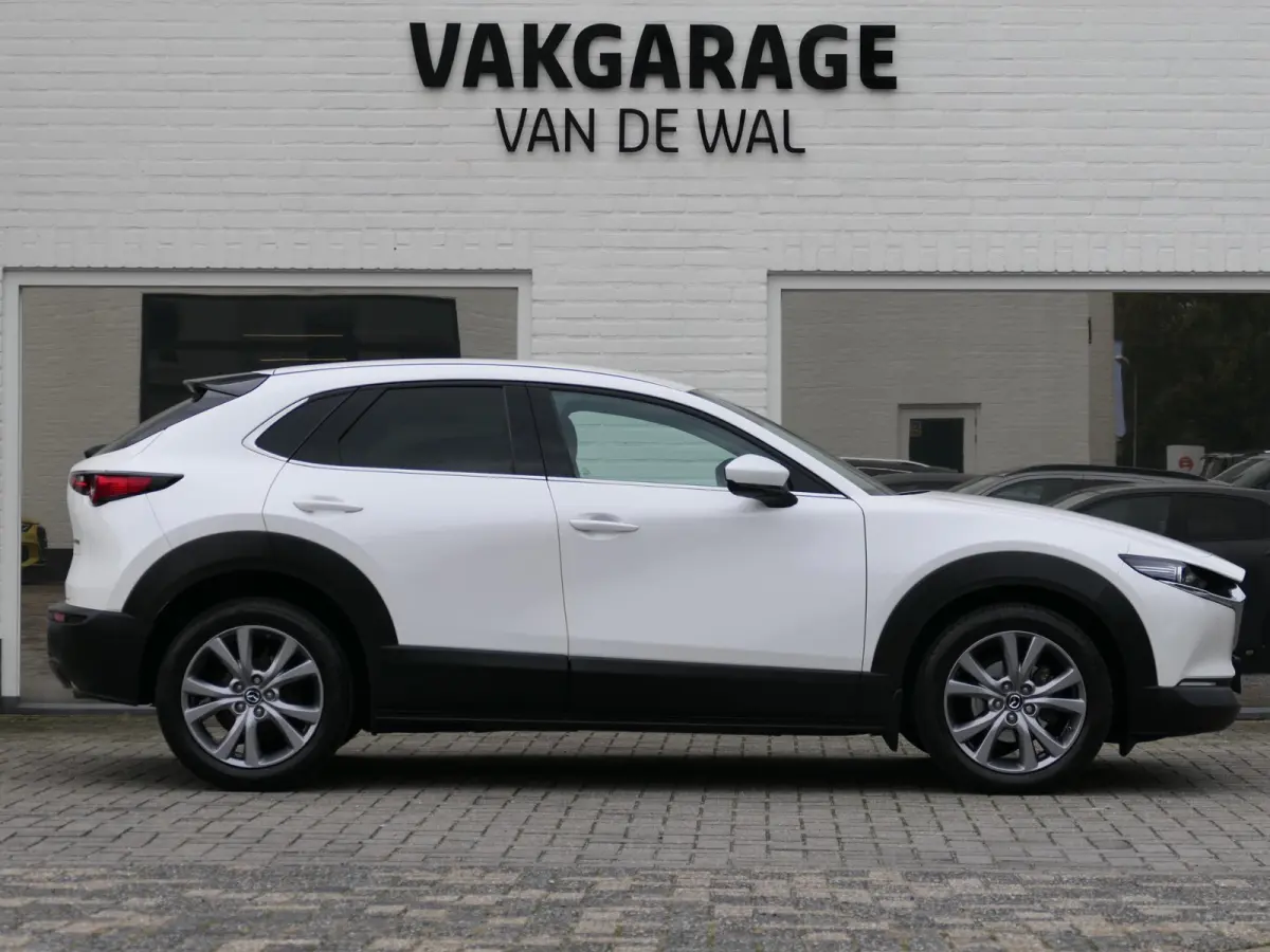 2.0 e-SkyActiv-G M Hybrid Sportive | BOSE | Head-up display | Leder | Memory | Elektrische achterklep | Apple-/Android Carplay | Dodehoek detectie | Stuur-/Stoelverwarming | Achteruitrijcame